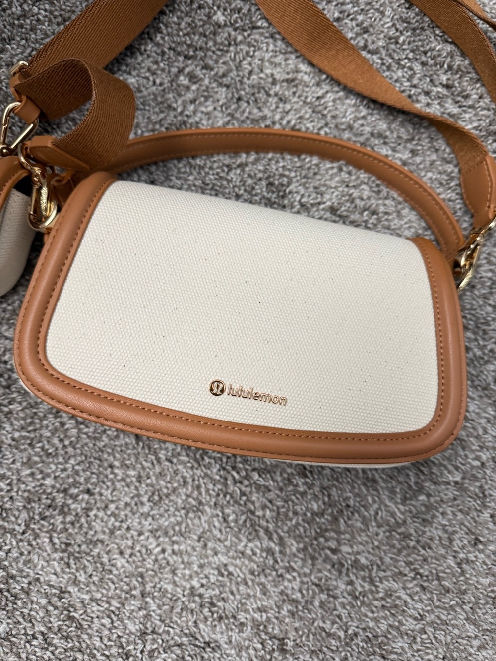 Lululemon tan/cream canvas mini bag with coin bag